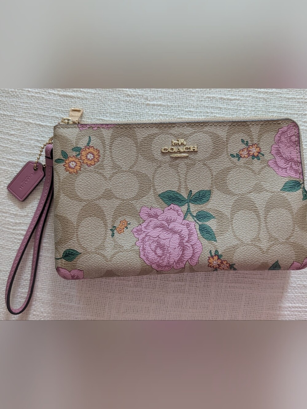 Coach Pink Floral Signature Zip Wristlet in Tan